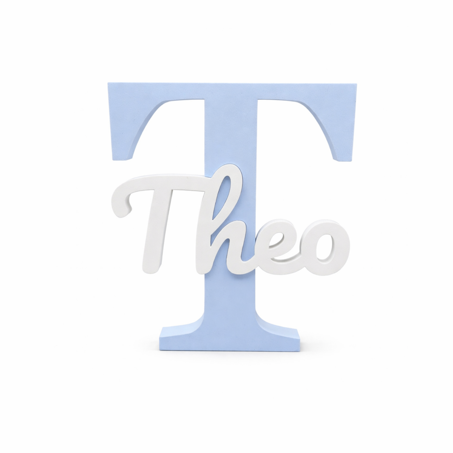 A light blue block letter T with the name Theo in white cursive script across the front, shown on a plain white background.