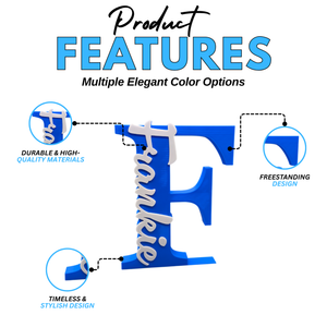 A 3D freestanding letter 'F' sign with the name 'Frankie' in white script across the front, shown on a white background with marketing text and circular callouts highlighting durable high-quality materials, freestanding design, and timeless stylish design.