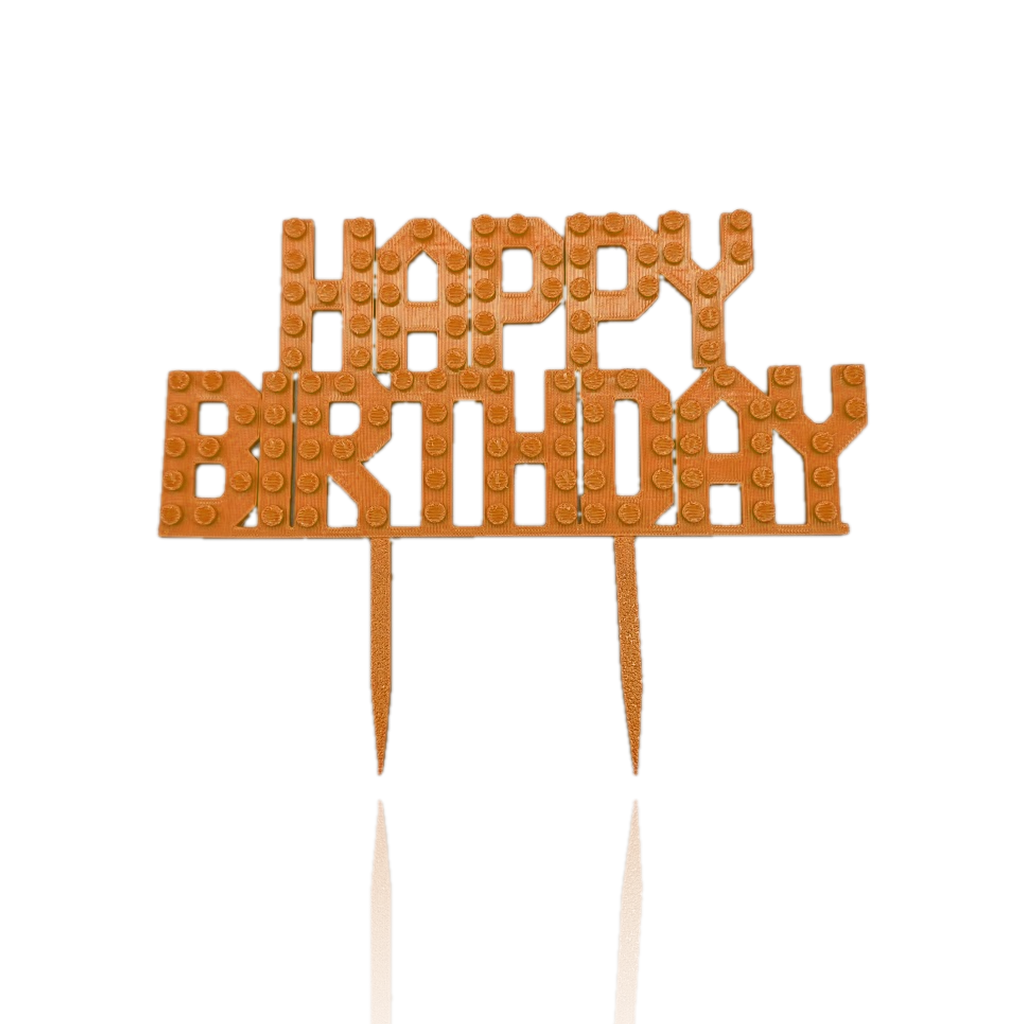 Orange 3D printed brick-stud Happy Birthday cake topper with raised lettering, building blocks party cake decoration, on white background