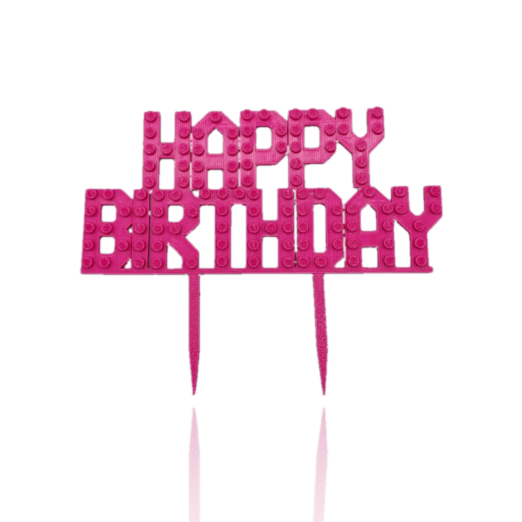 Pink 3D printed brick-stud Happy Birthday cake topper with raised lettering, building blocks party cake decoration, on white background