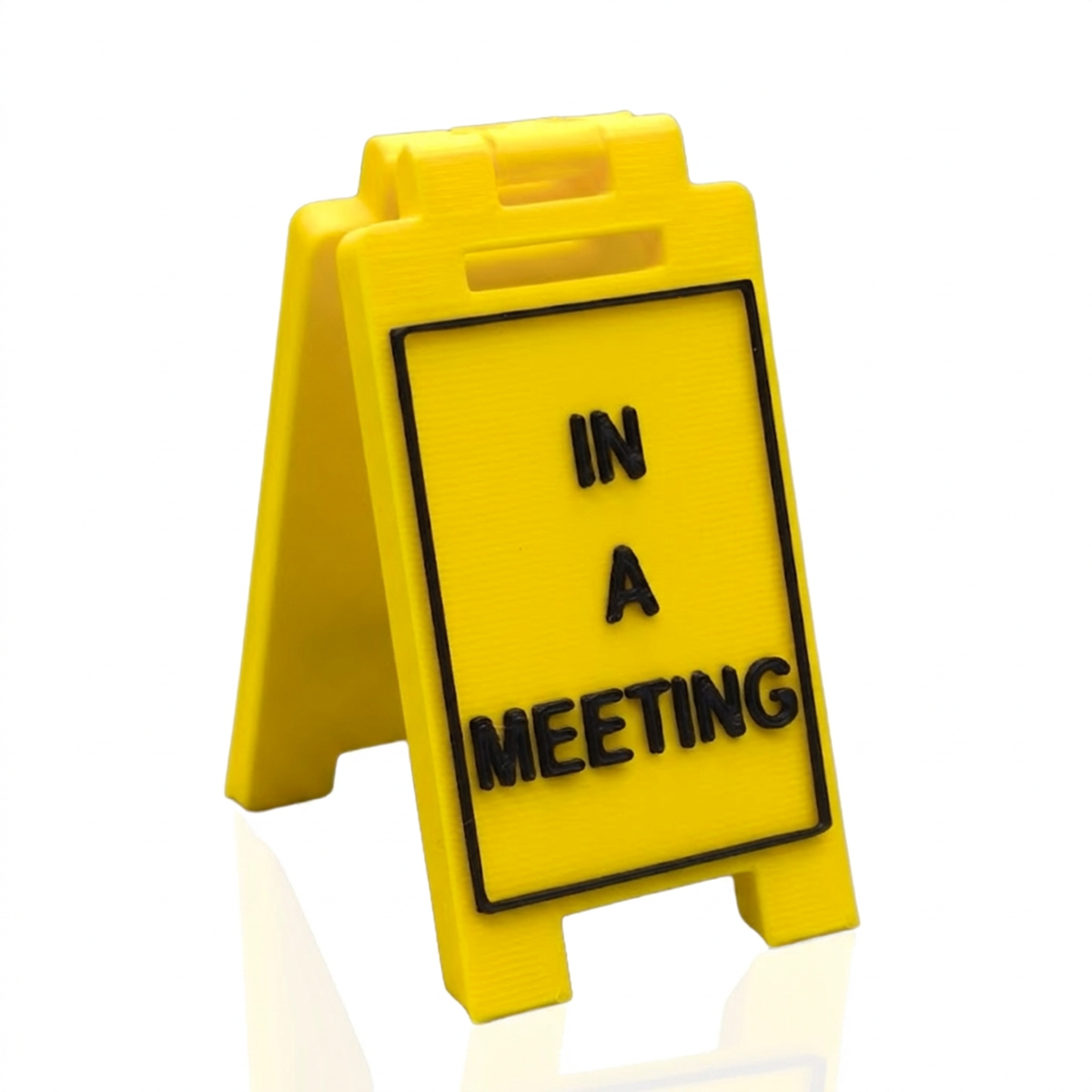 In A Meeting mini floor sign on a white background