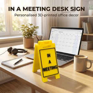 In A Meeting mini floor sign displayed in a home office
